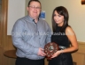 Camogie manager Tony O’Kane presents Eimear Quigg the award for most improved Camogier